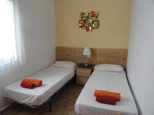 a bedroom in playamarina II
