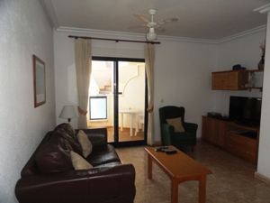 Lounge area in two bedroom apartment in playamarina II